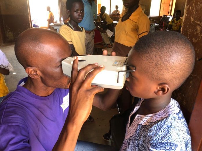 Some children undergoing eye screening at Babile